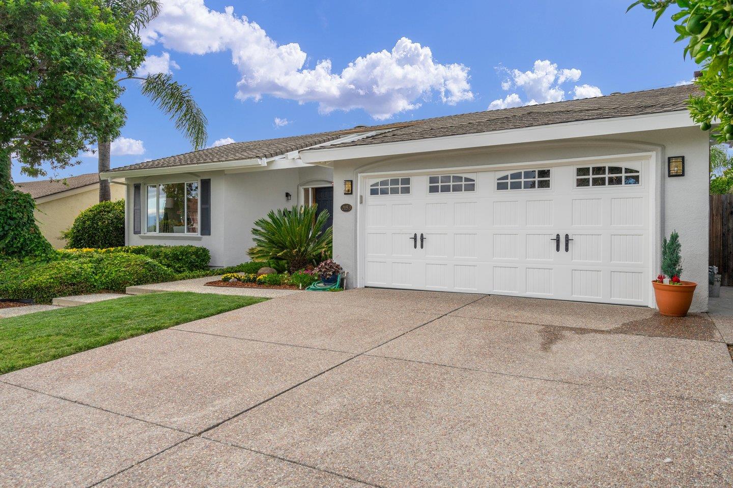 2153 Lacey Drive Milpitas, CA 95035 - Photo 4 of 42 a front view of a house with garden