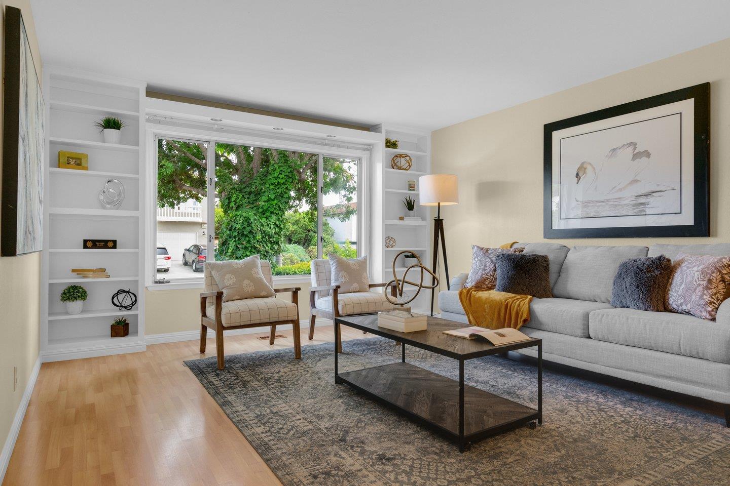 2153 Lacey Drive Milpitas, CA 95035 - Photo 8 of 42 a living room with furniture and a large window
