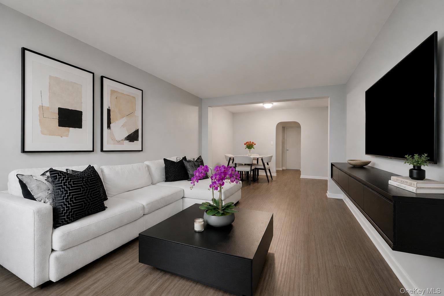 765 Bronx River Road, Unit 4A Bronxville, NY 10708 - Photo 9 of 15 Spacious open-concept living area with abundant natural light and a clean, modern aesthetic.