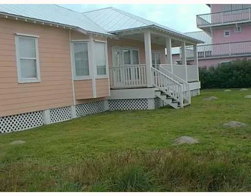 a view of a house with a garden