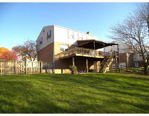 8849 Willoughby Road Pittsburgh, PA 15237 - Photo 15 of 17 Exterior Back. Two car garage with level, newer driveway.