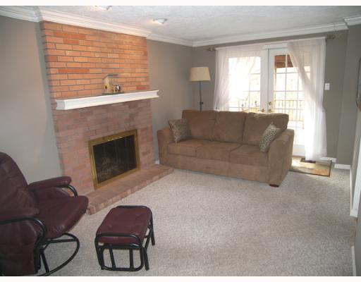 8849 Willoughby Road Pittsburgh, PA 15237 - Photo 6 of 17 Den/Family/Great Room. Relax in the family room with brick fireplace with raised hearth and door to a large covered deck.