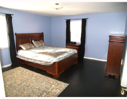 8849 Willoughby Road Pittsburgh, PA 15237 - Photo 9 of 17 Master Bedroom. Relax in the roomy master bedroom with overhead light and hardwood floor.