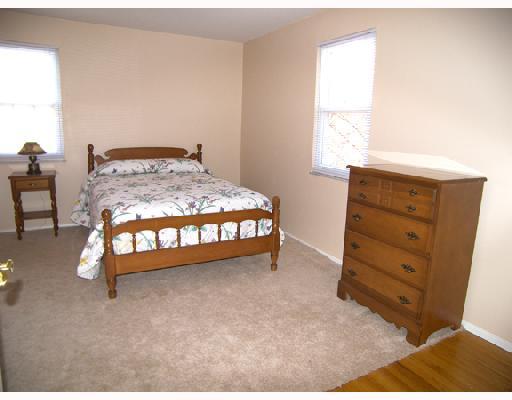 8849 Willoughby Road Pittsburgh, PA 15237 - Photo 10 of 17 Other. Freshly painted bedroom with side and rear windows and neutral decor.
