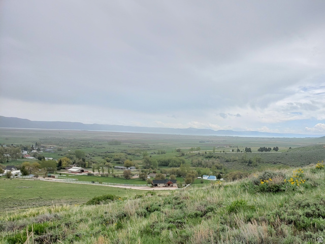 357 West 3rd Street North Bloomington, ID 83223 - Photo 6 of 10 Expansive hillside property featuring natural vegetation and distant valley landscape with scattered residential structures