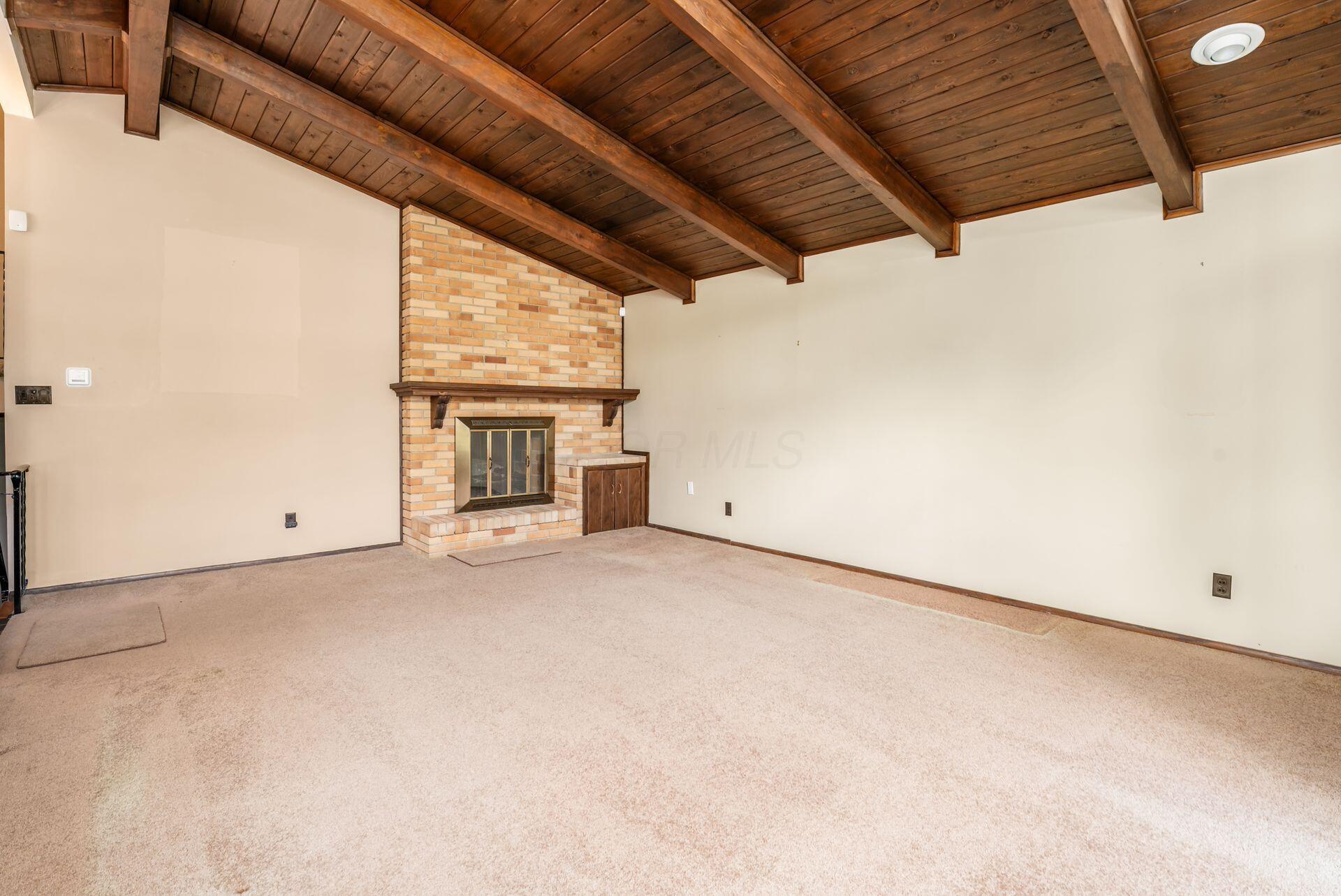 3419 Ridgewood Drive Hilliard, OH 43026 - Photo 10 of 51 floor to ceiling brick fireplace