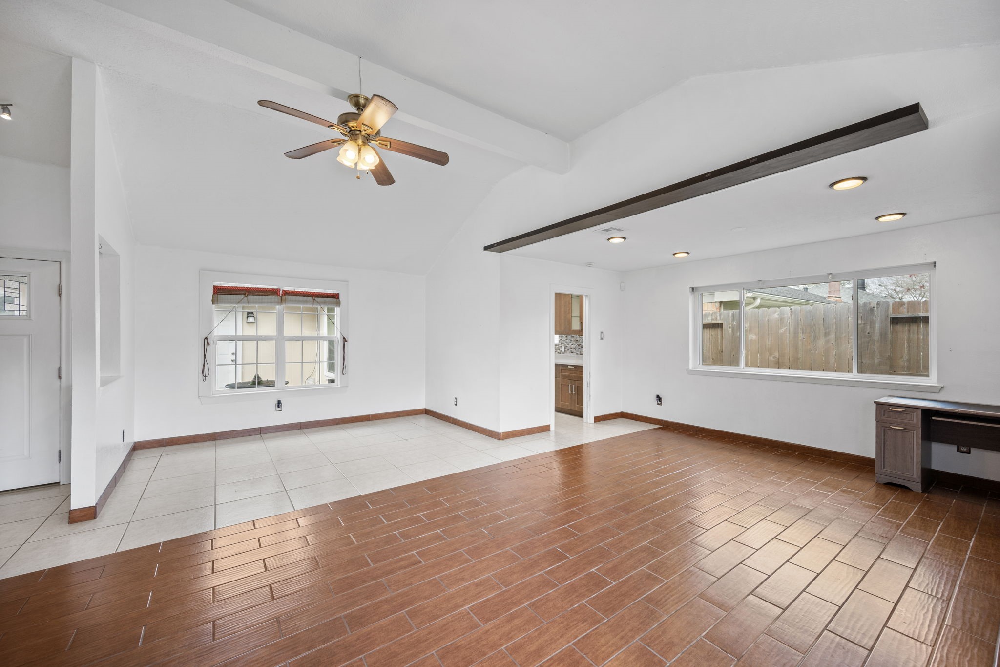 2327 Colonial Ridge Drive Friendswood, TX 77546 - Photo 13 of 27 wooden floor in an empty room with a window