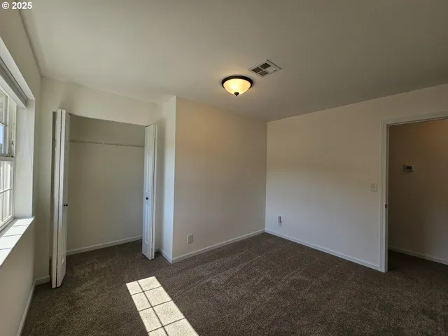 a view of an empty room with window