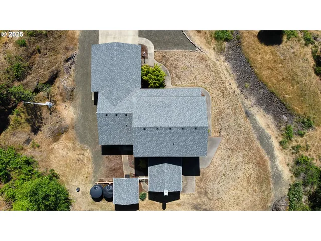 a black and white photo of a house