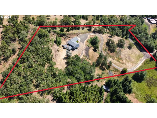 a black and white photo of a field