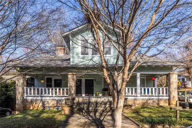 front view of a house with a small yard