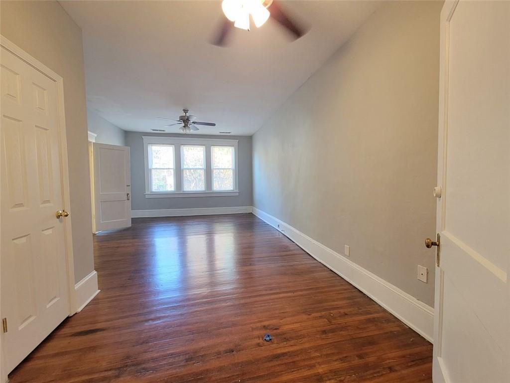 976 Delaware Avenue Southeast, Unit 2 Atlanta, GA 30316 - Photo 15 of 28 wooden floor in an empty room with a window