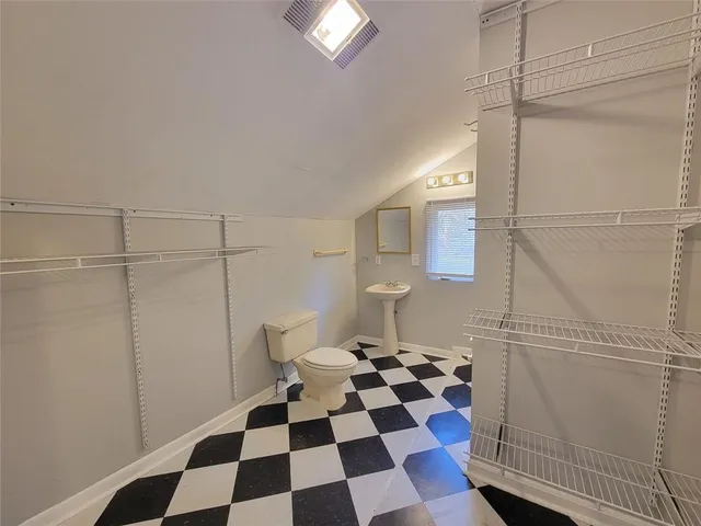 a black and white checkered floor with a black white checkered floor