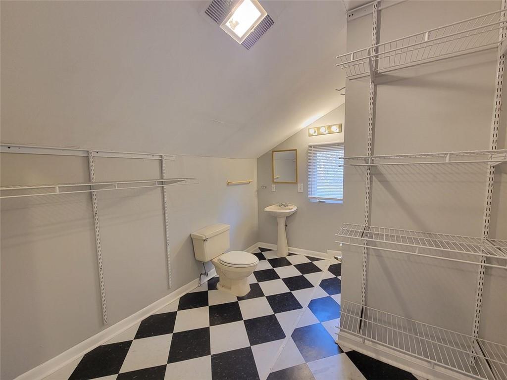 976 Delaware Avenue Southeast, Unit 2 Atlanta, GA 30316 - Photo 18 of 28 a black and white checkered floor with a black white checkered floor