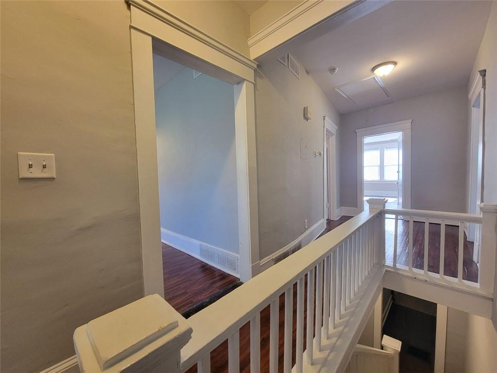 976 Delaware Avenue Southeast, Unit 2 Atlanta, GA 30316 - Photo 6 of 28 a view of a hallway with windows