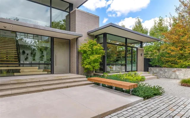 a garden view with a seating space