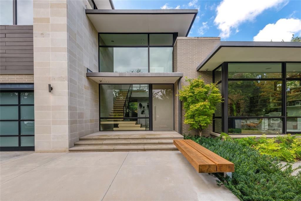 5420 Surrey Circle Dallas, TX 75209 - Photo 5 of 40 a view of a house with a large window and front door