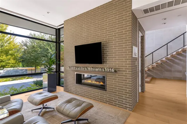 a spacious bathroom with a tub sink and mirror