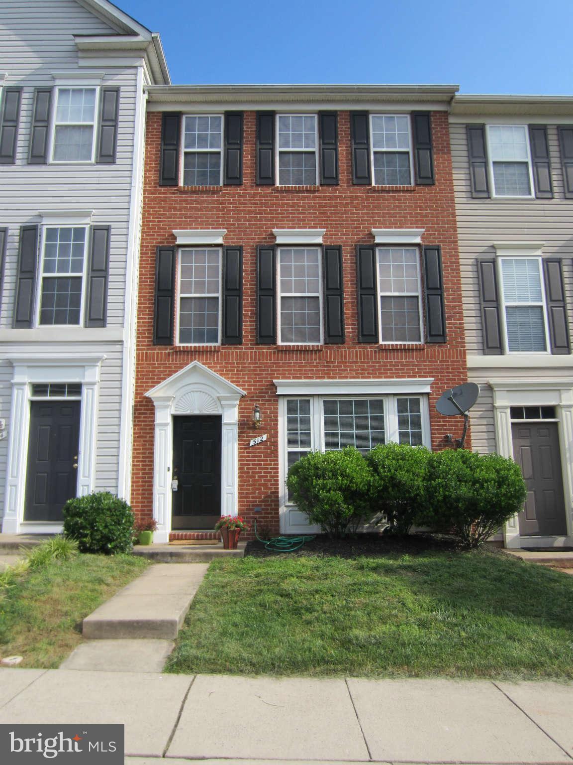 512 Ellison Court Frederick, MD 21703 - Photo 1 of 30 a front view of a house with garden