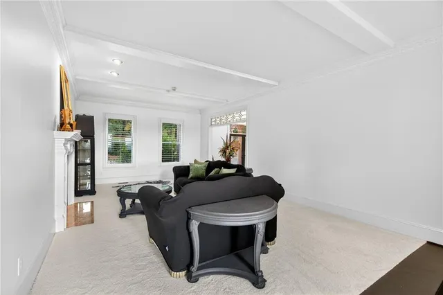 a kitchen with stainless steel appliances granite countertop a refrigerator and cabinets