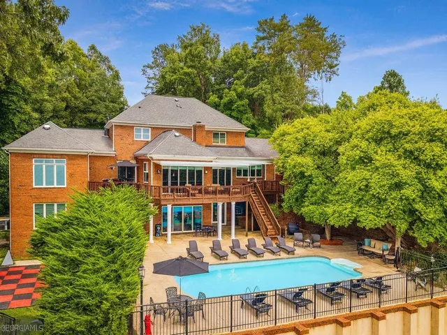 front view of residential houses with a yard