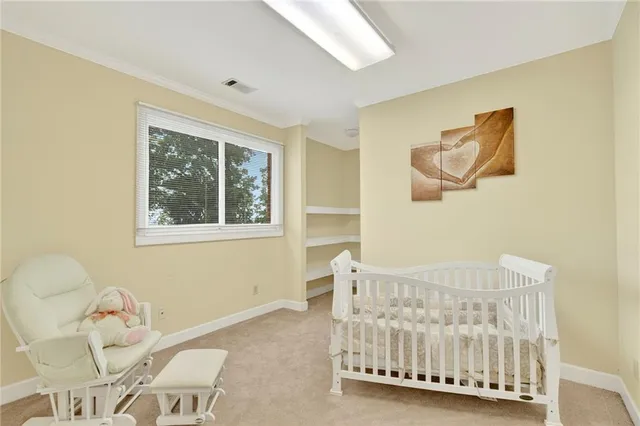 a view of a garage with rack and bicycle