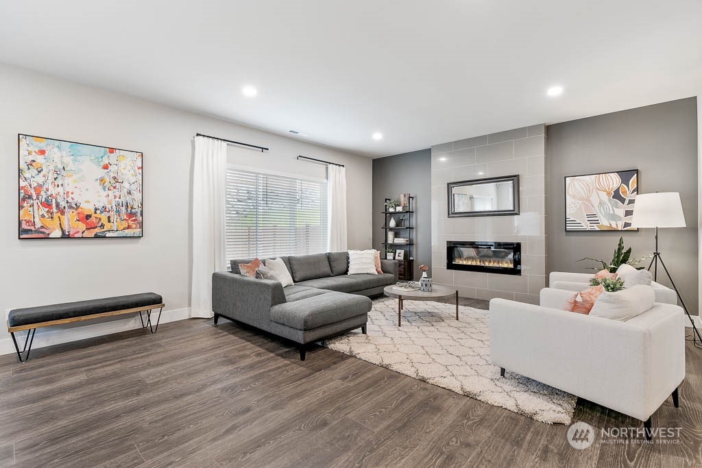 22917 20th Place West Bothell, WA 98021 - Photo 20 of 32 a living room with furniture and a flat screen tv