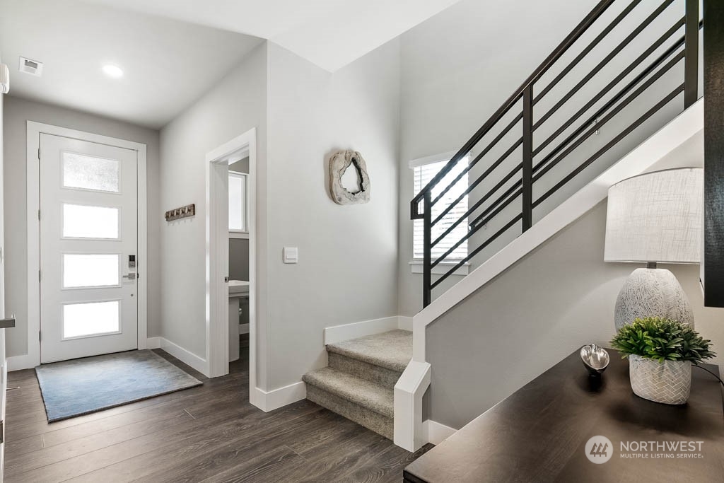 22917 20th Place West Bothell, WA 98021 - Photo 4 of 32 a view of entryway and hall with wooden floor