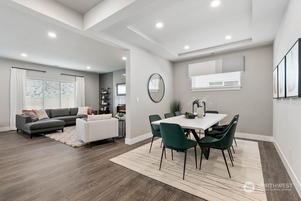 22917 20th Place West Bothell, WA 98021 - Photo 7 of 32 a living room with furniture a rug and a window