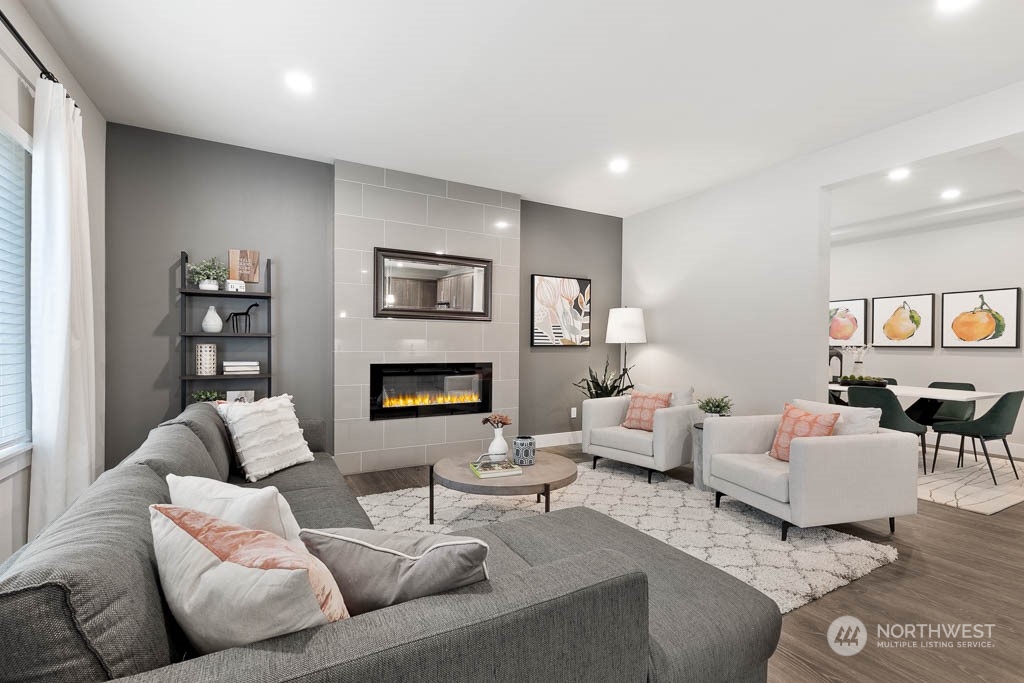 22917 20th Place West Bothell, WA 98021 - Photo 10 of 32 a living room with furniture and a fireplace