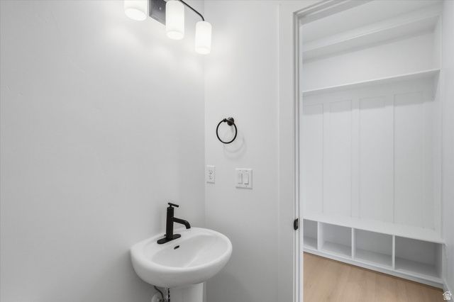 844 North 400 West Logan, UT 84321 - Photo 13 of 43 Pedestal sink with a matte black faucet and ring towel holder