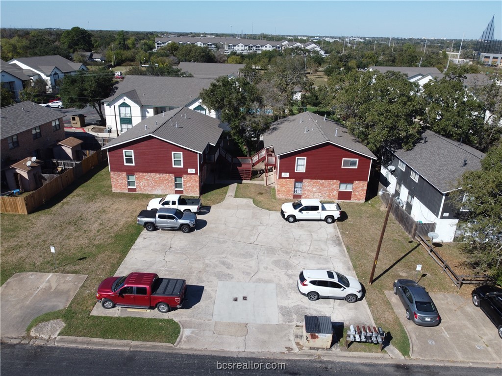 an aerial view of a house with a garden