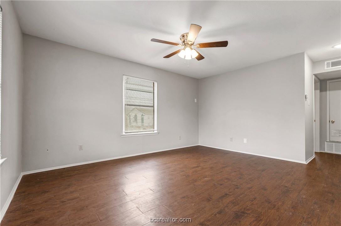 802-804 Navidad Street Bryan, TX 77801 - Photo 17 of 48 a view of a big room with wooden floor and windows in a room