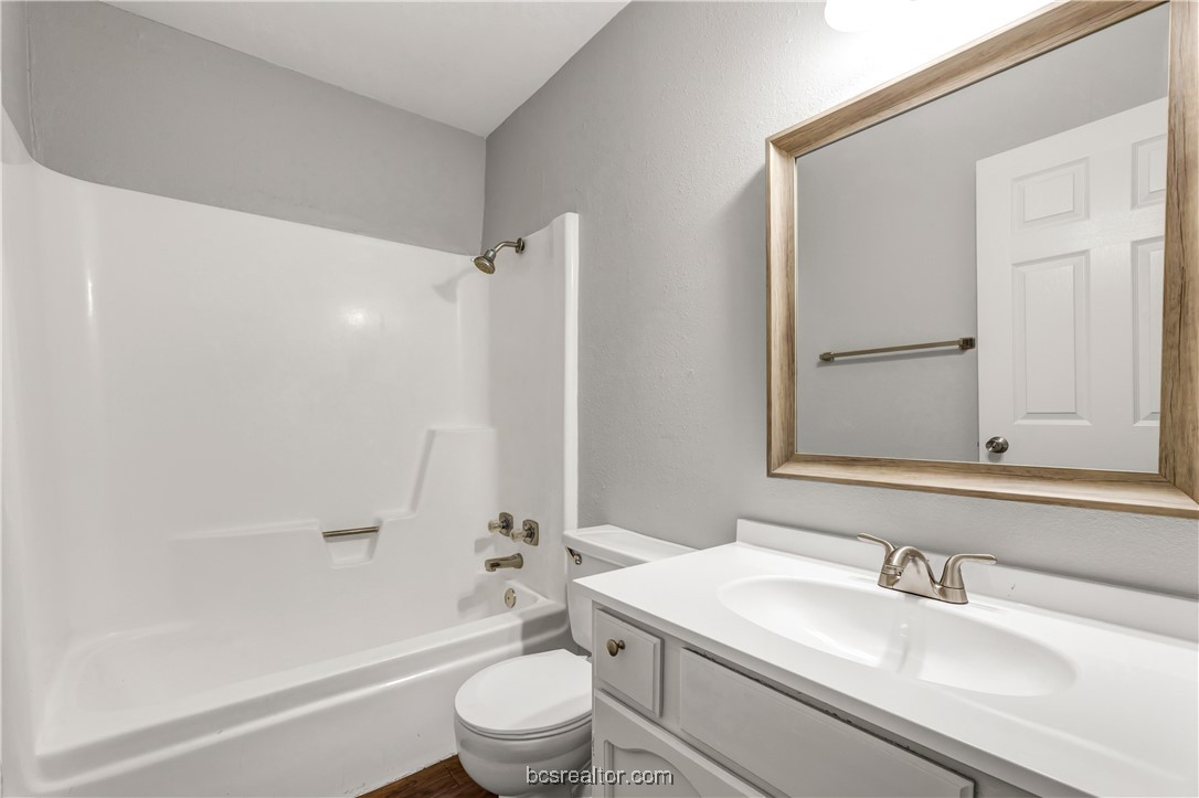 802-804 Navidad Street Bryan, TX 77801 - Photo 19 of 48 a bathroom with a sink a toilet and shower