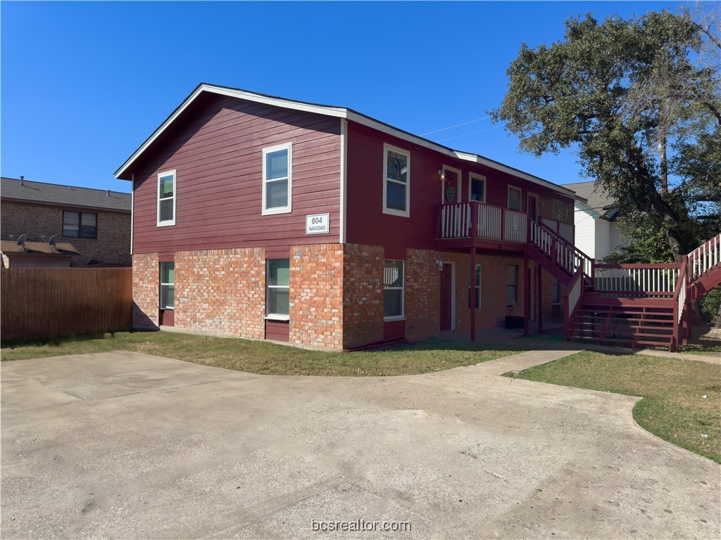 802-804 Navidad Street Bryan, TX 77801 - Photo 28 of 48 a front view of a house with a yard