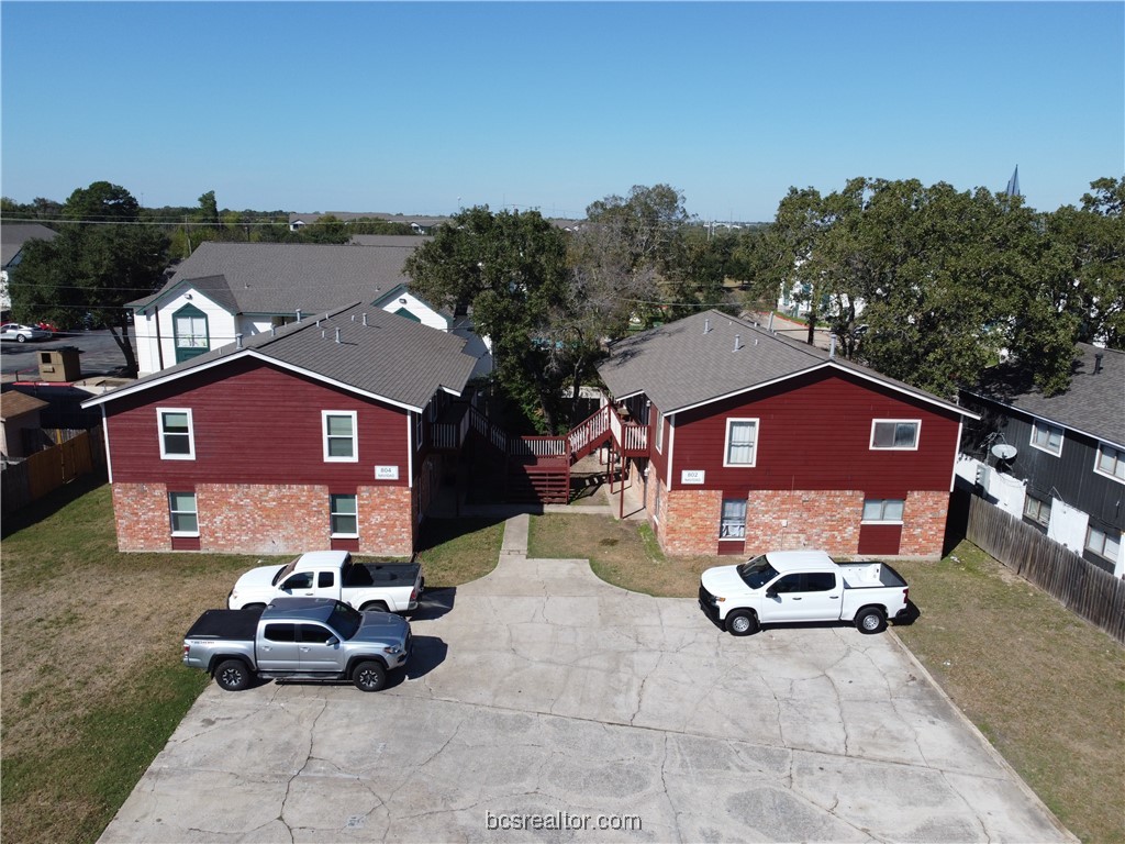 802-804 Navidad Street Bryan, TX 77801 - Photo 47 of 48 a front view of a house with a yard and garage