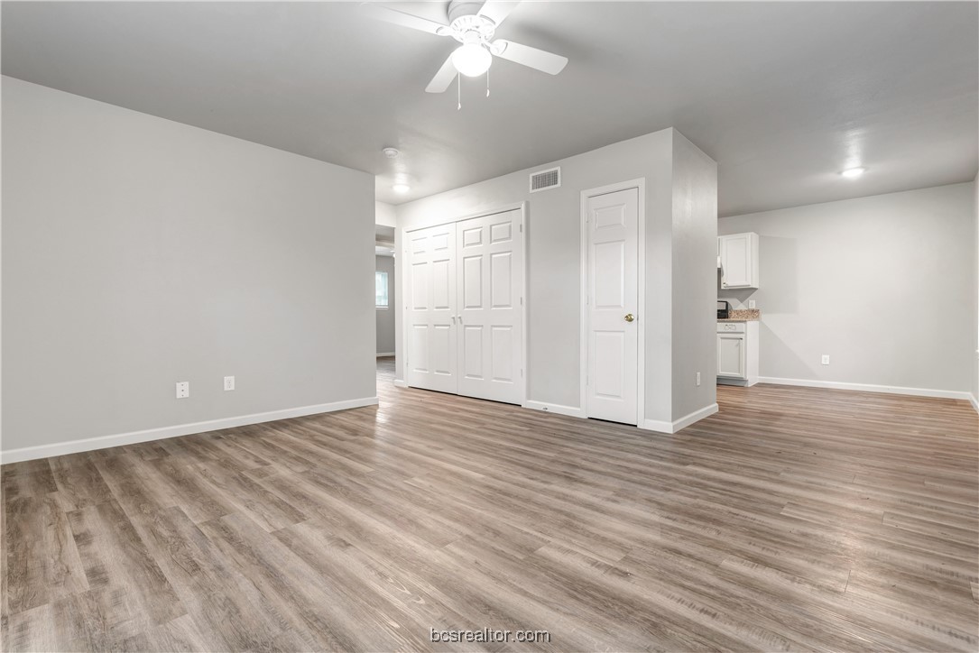 802-804 Navidad Street Bryan, TX 77801 - Photo 10 of 48 a view of an empty room with wooden floor