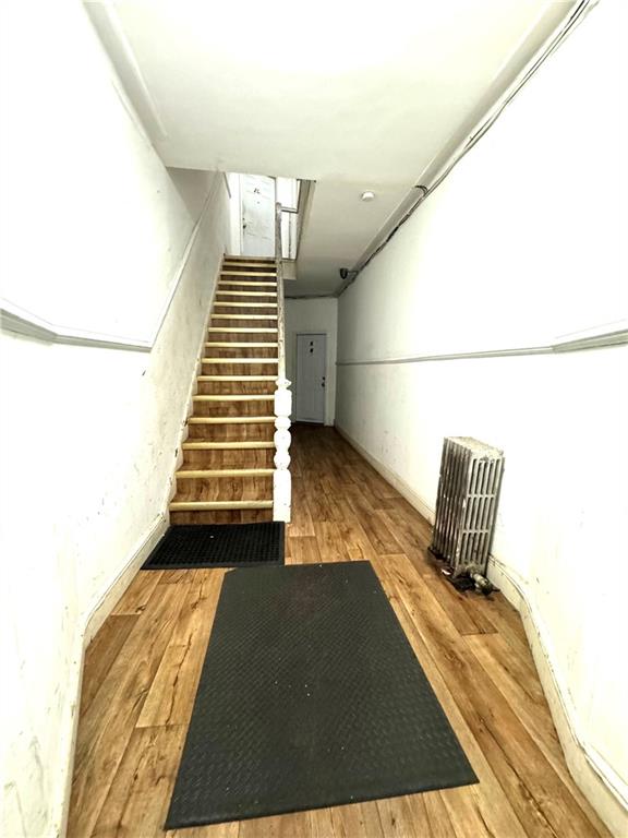 527 49th Street Brooklyn, NY 11220 - Photo 3 of 9 a view of a room with wooden floor