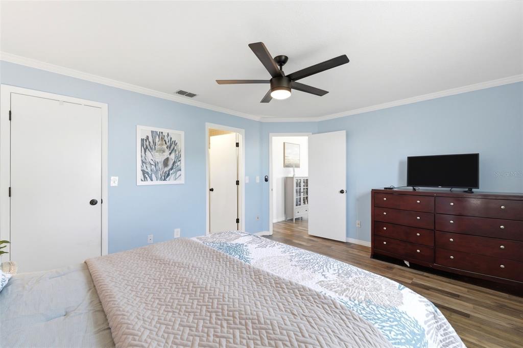 6129 Elmhurst Drive New Port Richey, FL 34653 - Photo 12 of 34 a bedroom with a bed and a window