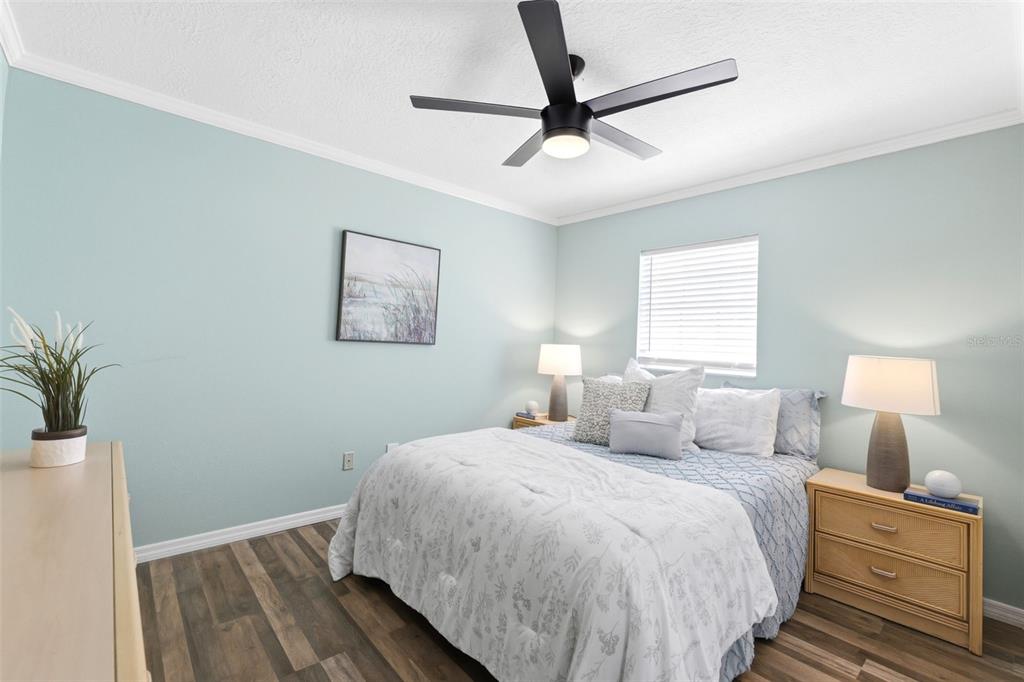 6129 Elmhurst Drive New Port Richey, FL 34653 - Photo 15 of 34 a bedroom with a bed and a window