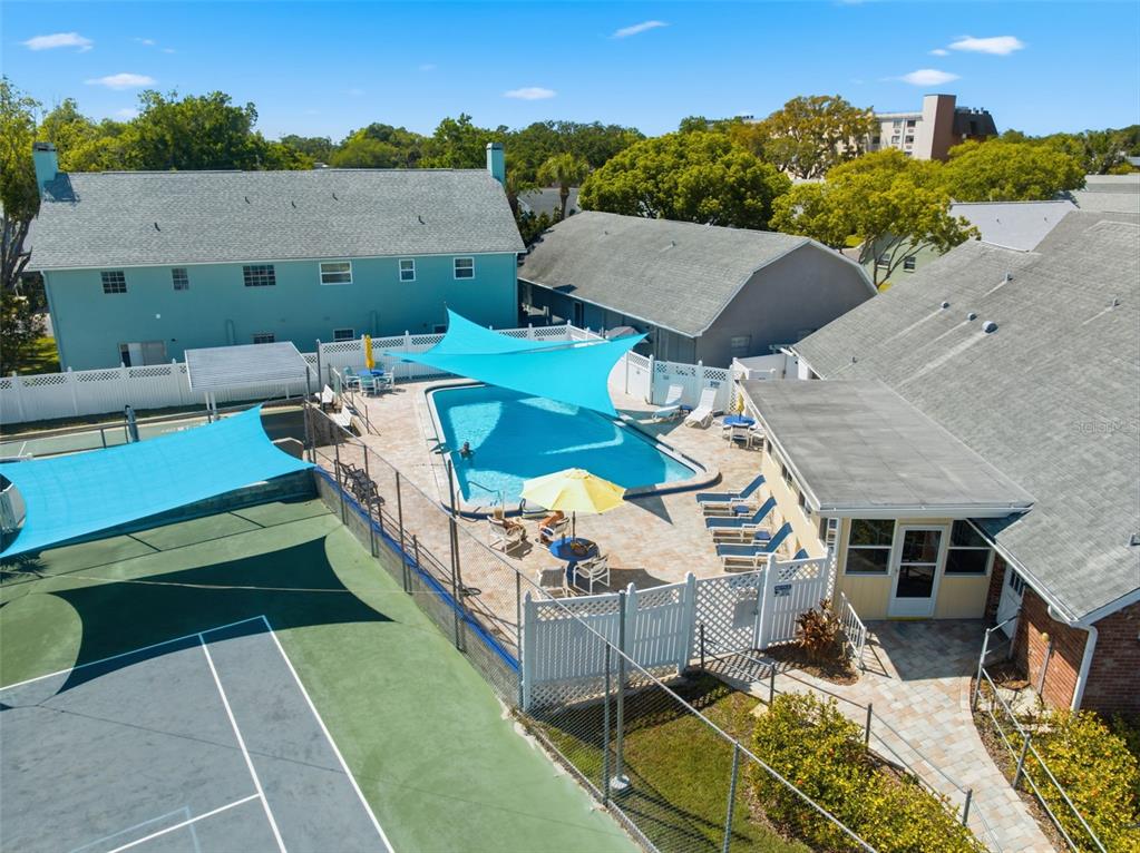 6129 Elmhurst Drive New Port Richey, FL 34653 - Photo 20 of 34 an aerial view of a house with swimming pool