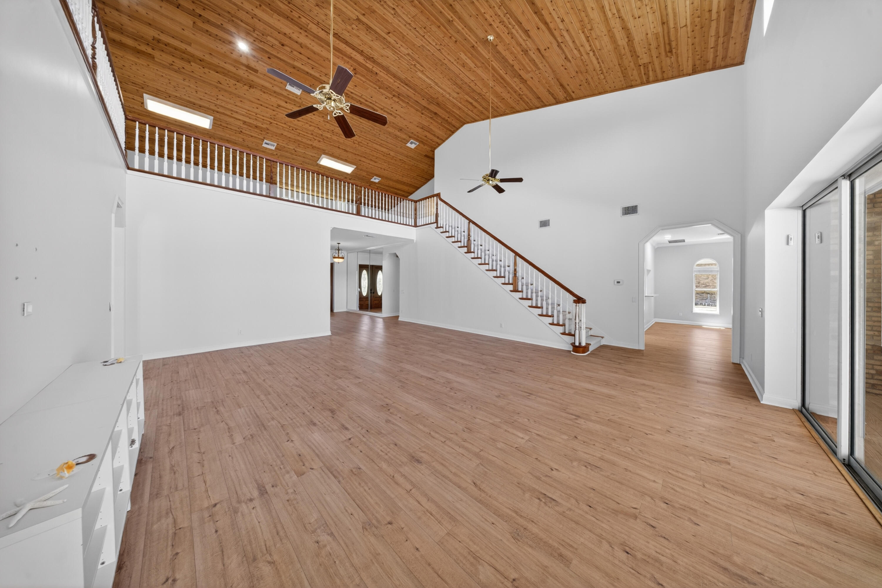 8686 Andrews Avenue Fort Pierce, FL 34945 - Photo 40 of 76 a view of a room with wooden floor
