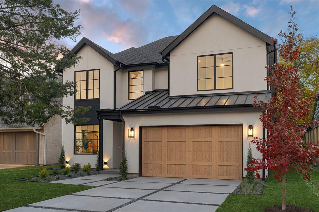 7403 Robin Road Dallas, TX 75209 - Photo 1 of 1 a front view of a house with a garden