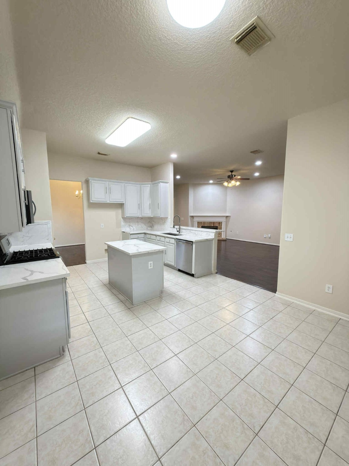 9531 Summer Run Houston, TX 77064 - Photo 11 of 29 a kitchen with a sink and white cabinets