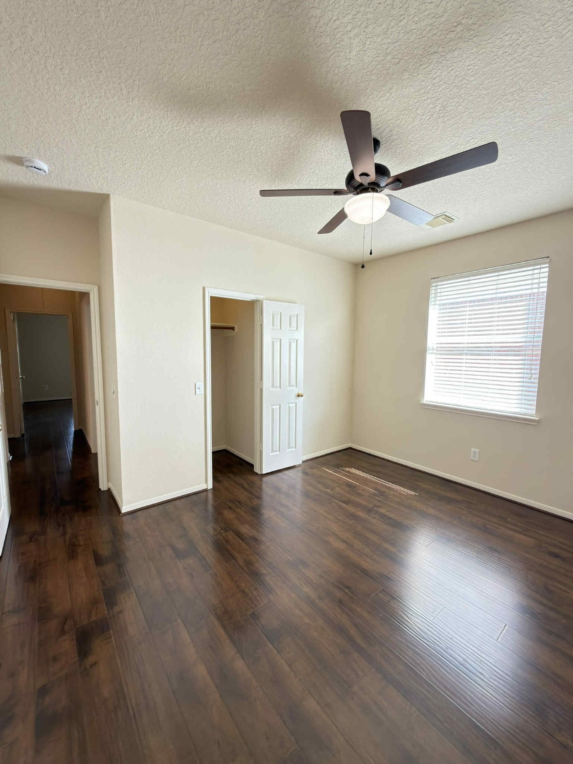 9531 Summer Run Houston, TX 77064 - Photo 24 of 29 a view of an empty room with window and wooden floor