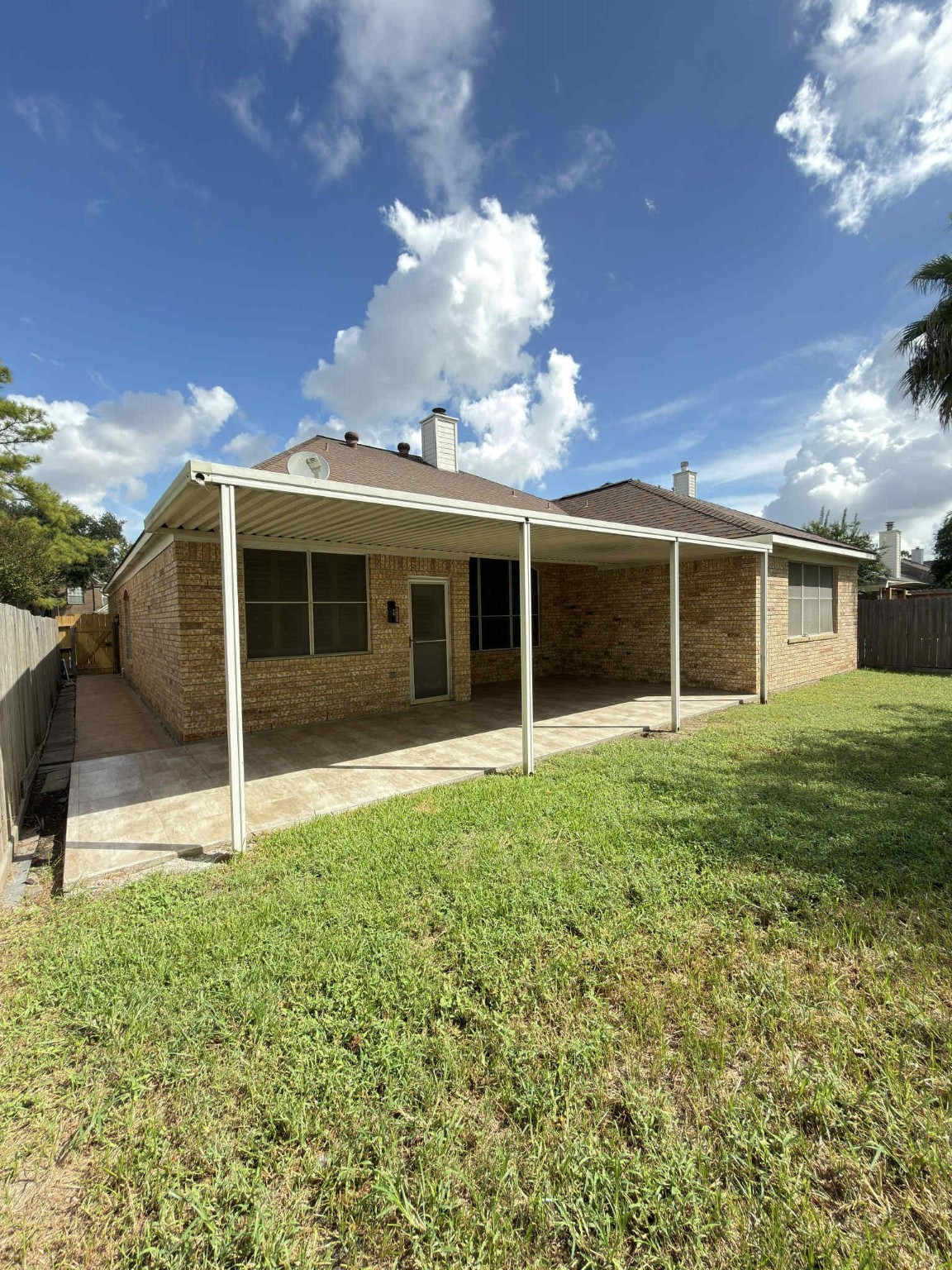 9531 Summer Run Houston, TX 77064 - Photo 28 of 29 a view of an house with backyard space and garden