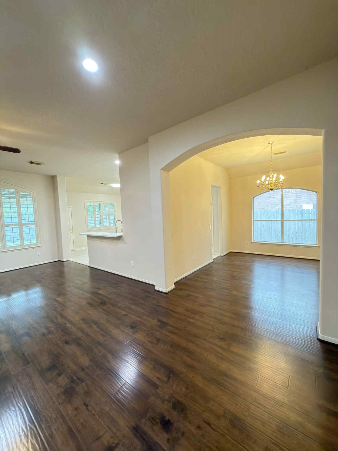 9531 Summer Run Houston, TX 77064 - Photo 6 of 29 an empty room with wooden floor and windows