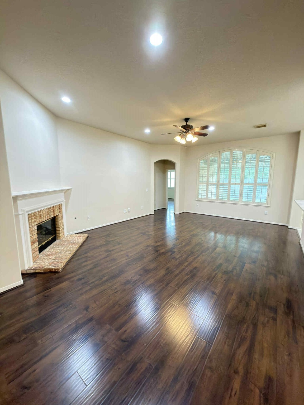 9531 Summer Run Houston, TX 77064 - Photo 7 of 29 an empty room with wooden floor and windows