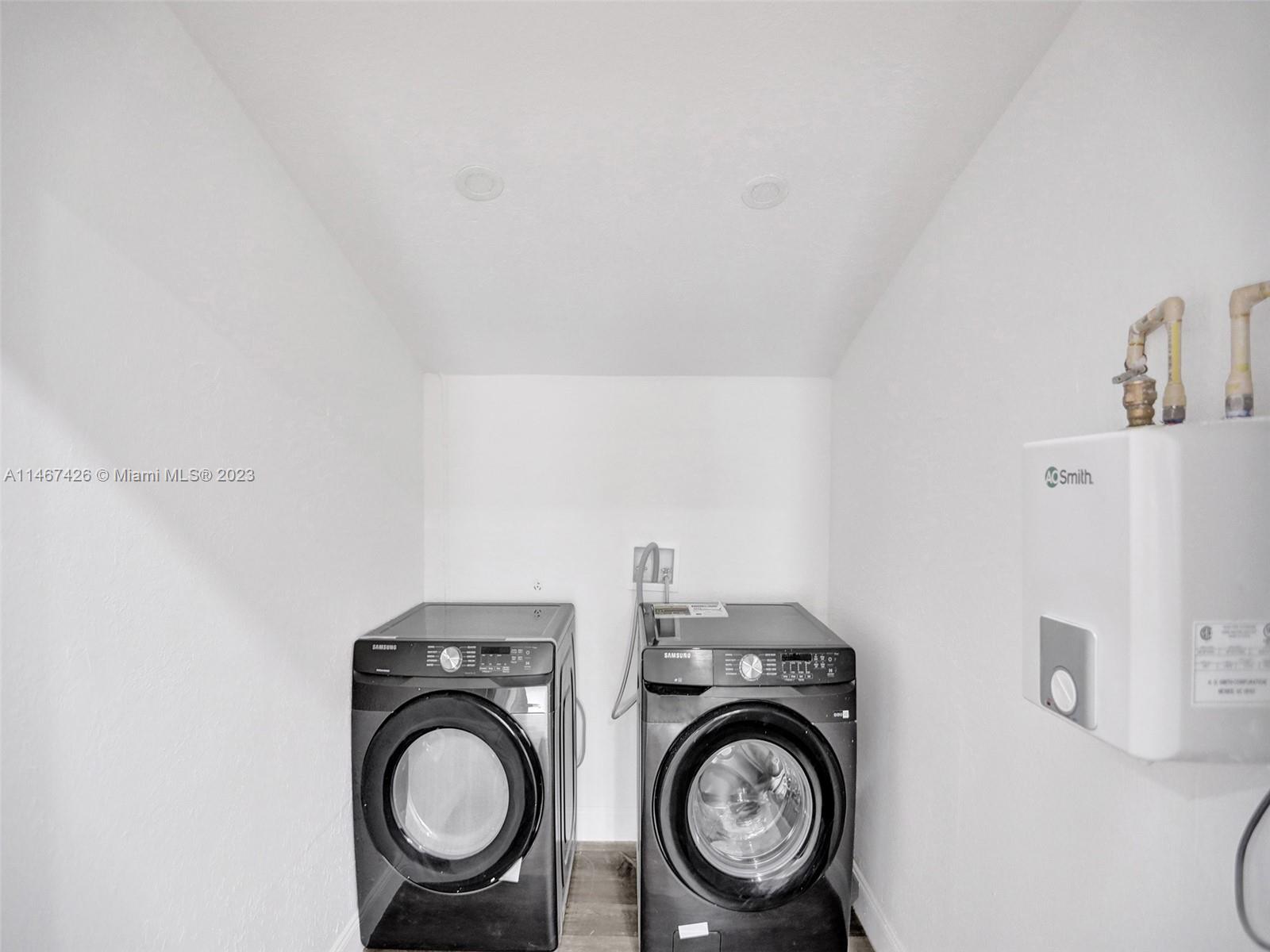 167 Northwest 84th Street Miami, FL 33150 - Photo 14 of 39 a view of washer and dryer