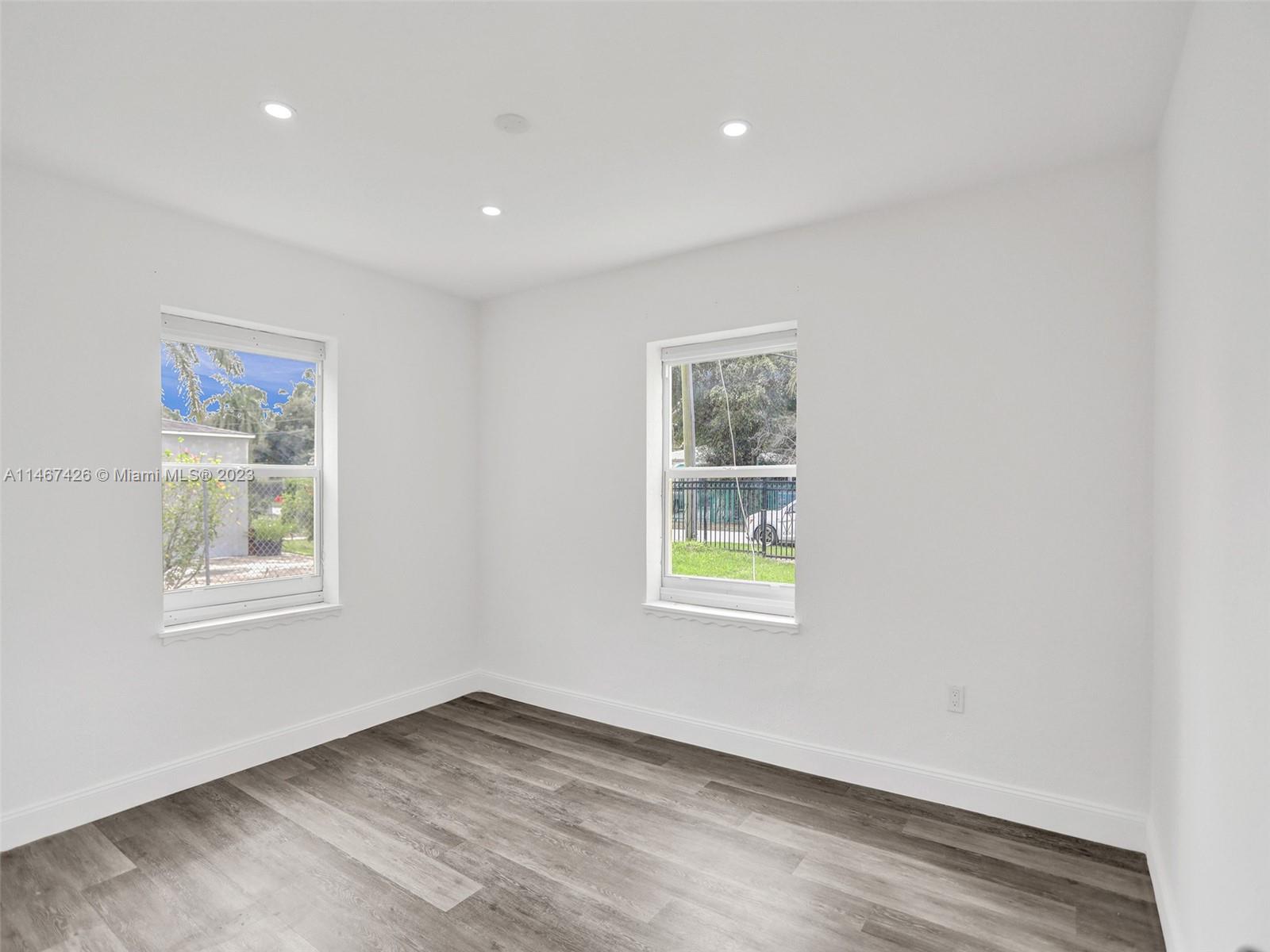 167 Northwest 84th Street Miami, FL 33150 - Photo 21 of 39 a view of an empty room with a window